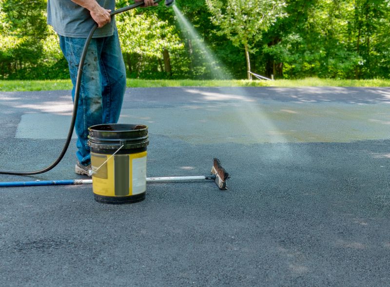 Local Blacktop Driveway Sealing pros at work